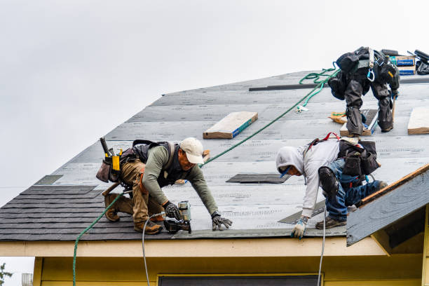 Professional Roof Replacement technician working in Hathorne, MA